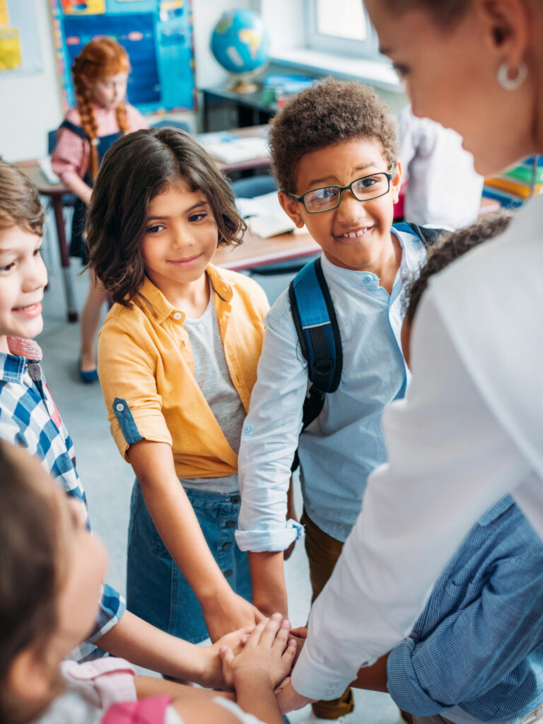 Educator supporting students in a classroom